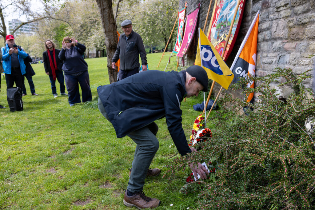 NUJ South West England branch chair Paul Breeden lays a wreath in Castle Park in memory of journalists who have died in Gaza, Israel and elsewhere in the last year. Picture © Felix Wong