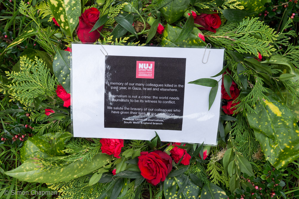 The NUJ South West England Branch wreath at Workers Memorial Day in Bristol. The event is organised by Bristol Trades Union Council each year and held in Castle Park. Photo ©Simon Chapman 2024.  
