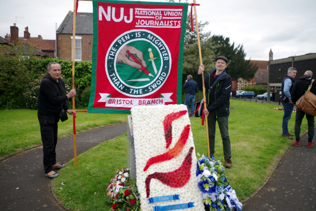 Kate Pearce, NUJ SWE Somerset rep, and Paul Breeden, branch chair, hold the NUJ banner at the Bridgwater event in Blake Gardens Picture © Kate Pearce 2024