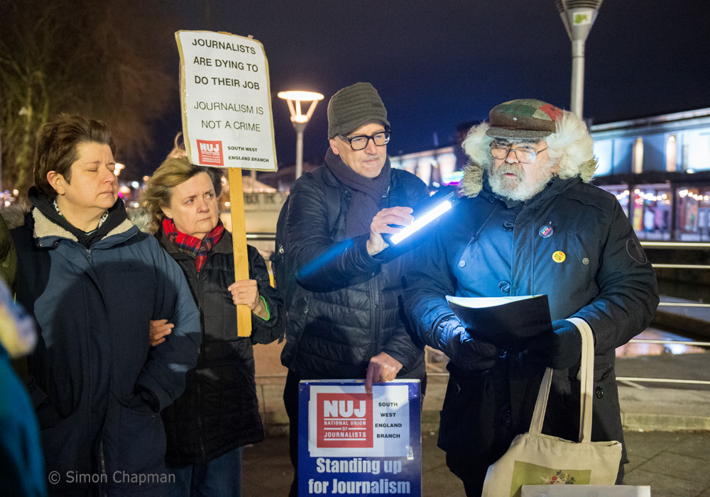 Mike Jempson reads his poem, The Objective I, about the perspective of a journalist, at the SWE NUJ vigil on December 10. Photo: Simon Chapman
